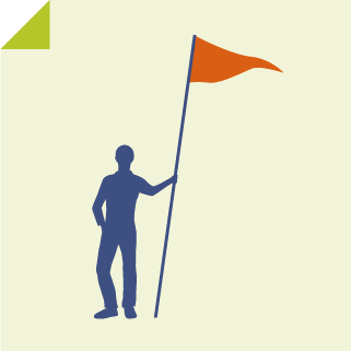 Man standing holding a flag.